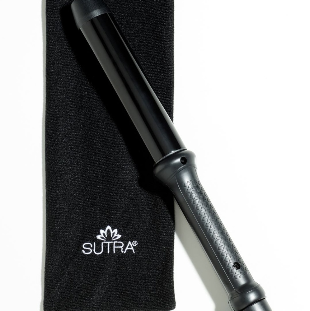 Clipless curling iron